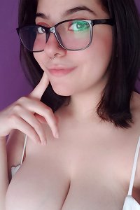 two plus-size girls vigorously kissing each other