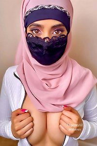 voluptuous girl posed provocatively in undergarments